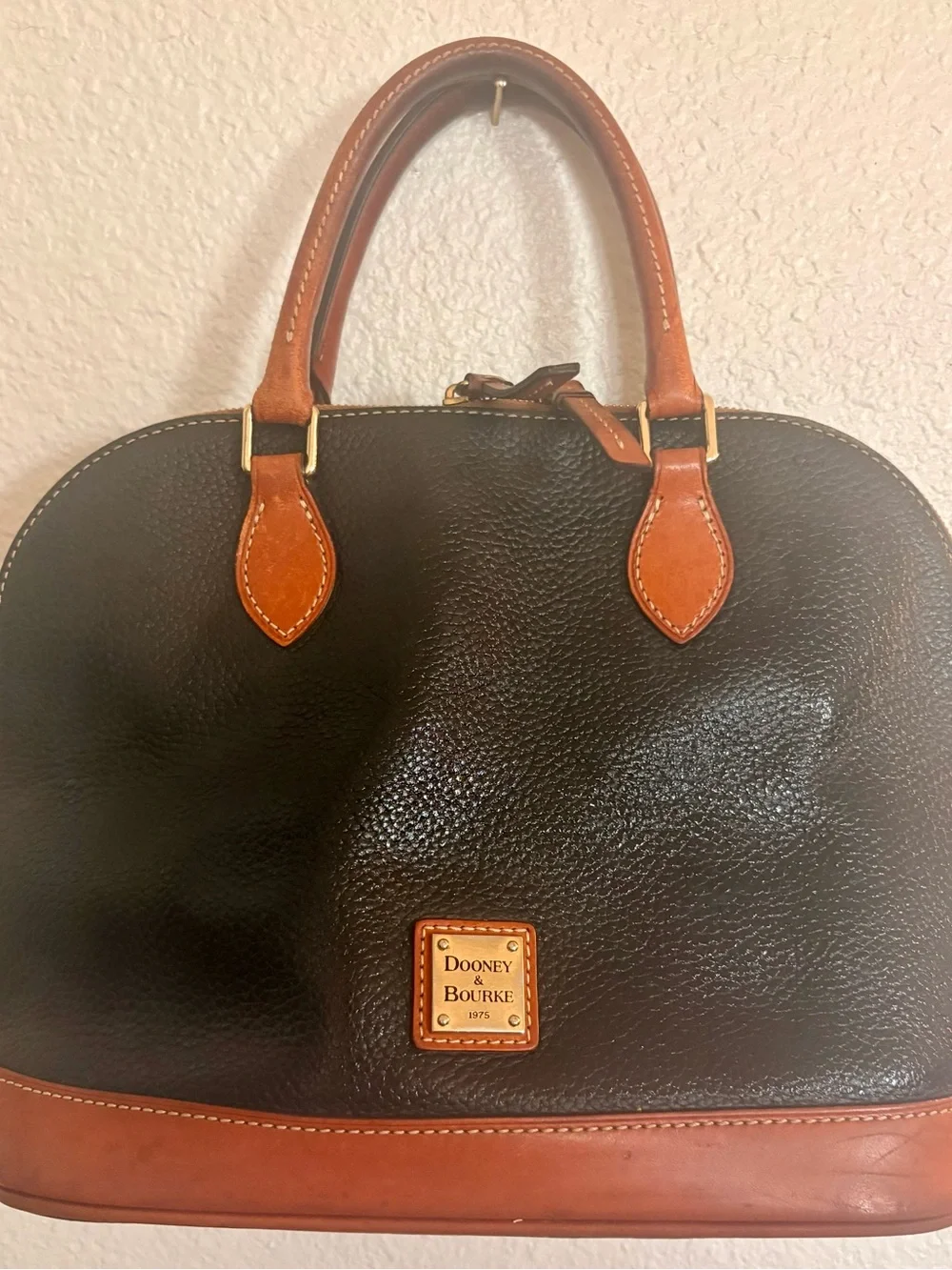Dooney & Bourke Black Leather Satchel with Brown Trim and Handles